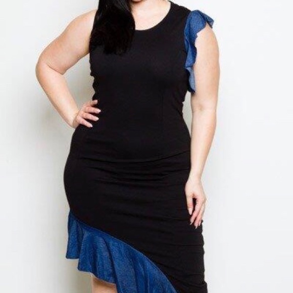 Midi black dress with asymmetrical side.